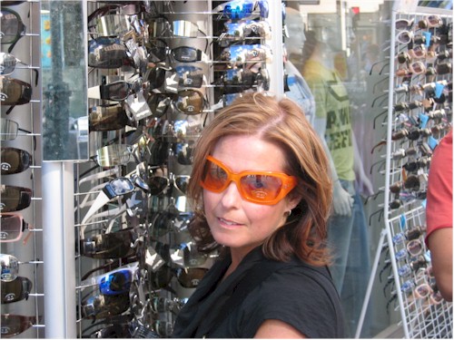 linda trying on sunglasses
